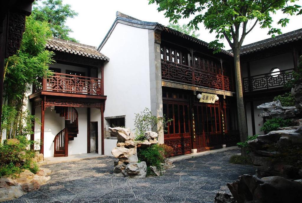 Yangzhou Centre And Residence Quarto foto