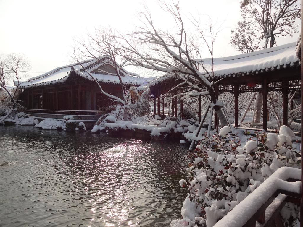 Yangzhou Centre And Residence Quarto foto